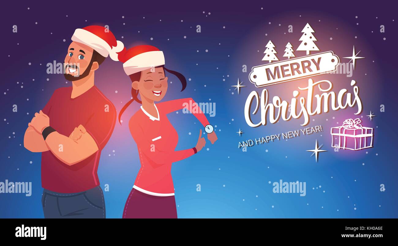 Happy Couple Wearing Santa Hats Man And Woman Christmas And New Year ...