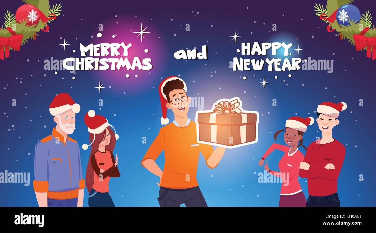 Happy People Wearing Santa Hats Man Holding Present Box Christmas And ...