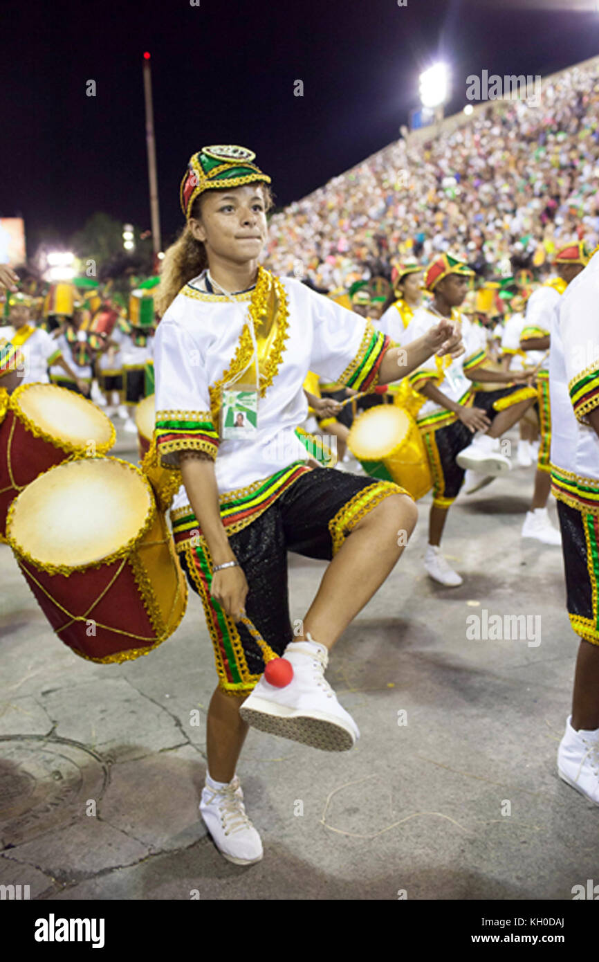 A musician from Império de Tijuca’s rhythm sections sets the samba beat ...