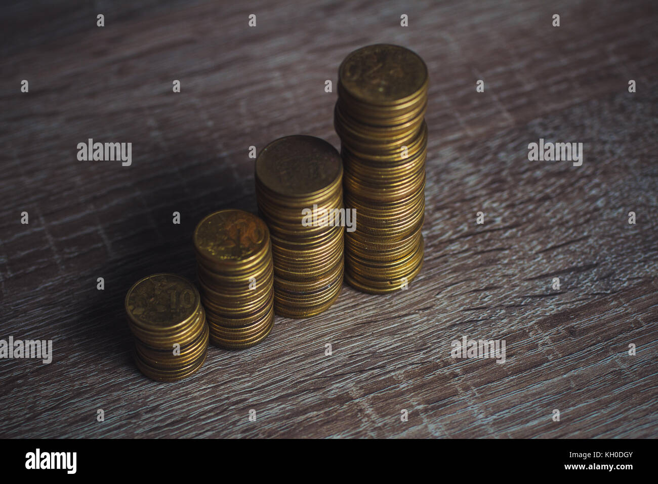 Coin stacks on a dark background, Money, Financial ...