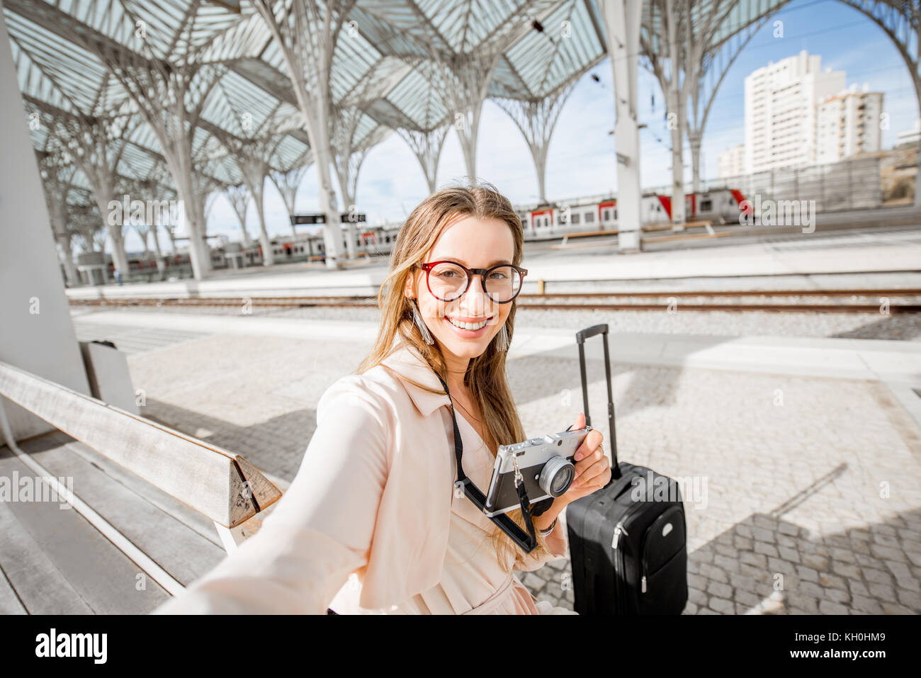 Woman at the railway station Stock Photo - Alamy