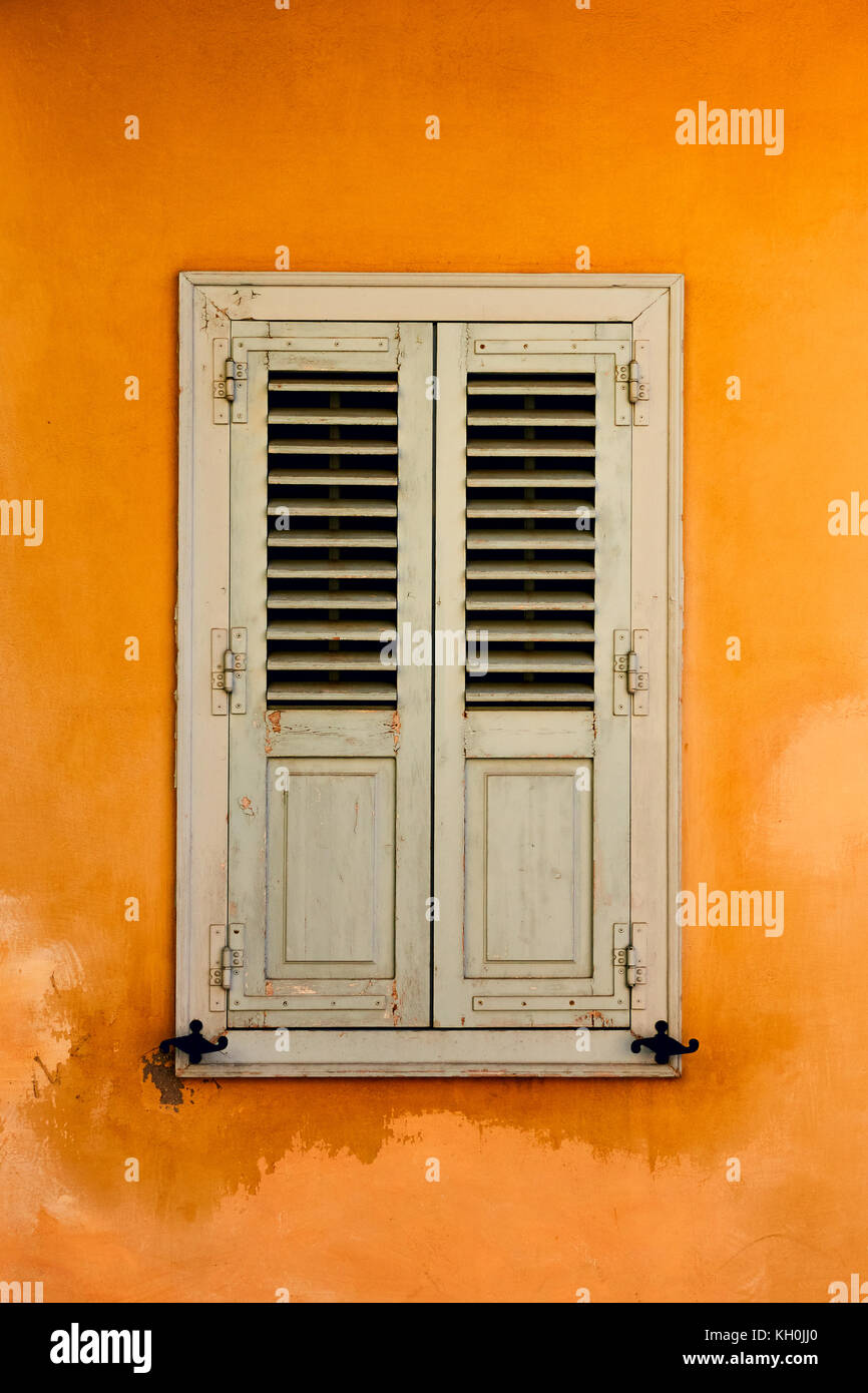 Window with shutters in Plaka district in Athens, Greece Stock Photo