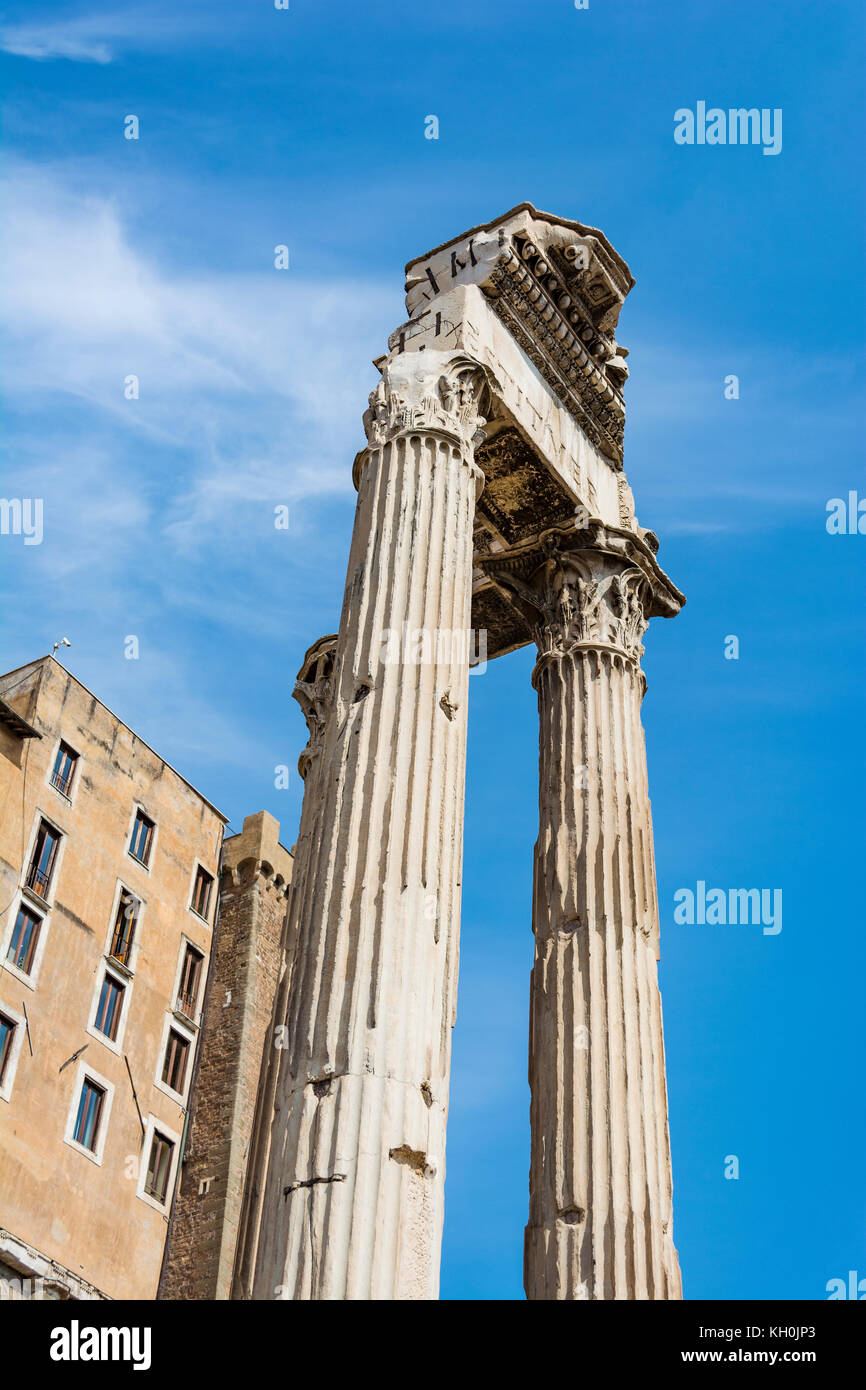 Temple of Vespasian and Titus in Roman Forum, Rome. The Roman Forum is one of the main tourist attractions of Rome. Stock Photo
