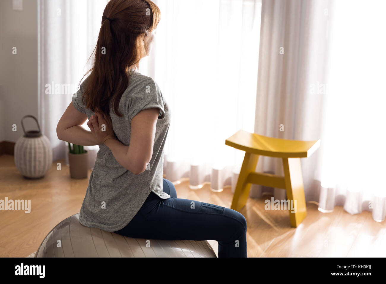Shot of a woman doing exercise at home Stock Photo - Alamy