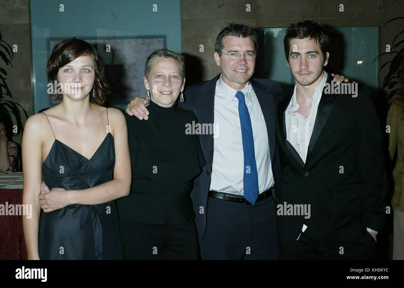 Maggie Gyllenhaal, her mother, Naomi Foner Gyllenhaal, her father, Stephen Gyllenhaal, and brother Jake Gyllenhaal arrive at the ACLU Torch of Liberty Awards on May 19, 2003 in Beverly Hills, California. Photo by Francis Specker Stock Photo