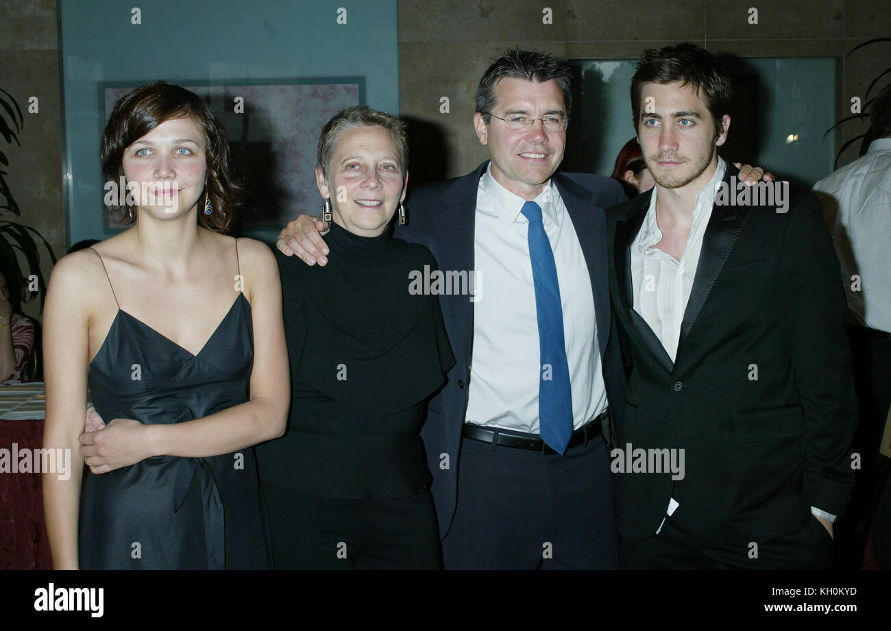 Maggie Gyllenhaal, her mother, Naomi Foner Gyllenhaal, her father, Stephen Gyllenhaal, and brother Jake Gyllenhaal arrive at the ACLU Torch of Liberty Awards on May 19, 2003 in Beverly Hills, California. Photo by Francis Specker Stock Photo