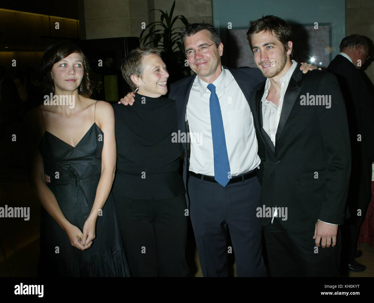 Maggie Gyllenhaal, her mother, Naomi Foner Gyllenhaal, her father, Stephen Gyllenhaal, and brother Jake Gyllenhaal arrive at the ACLU Torch of Liberty Awards on May 19, 2003 in Beverly Hills, California. Photo by Francis Specker Stock Photo