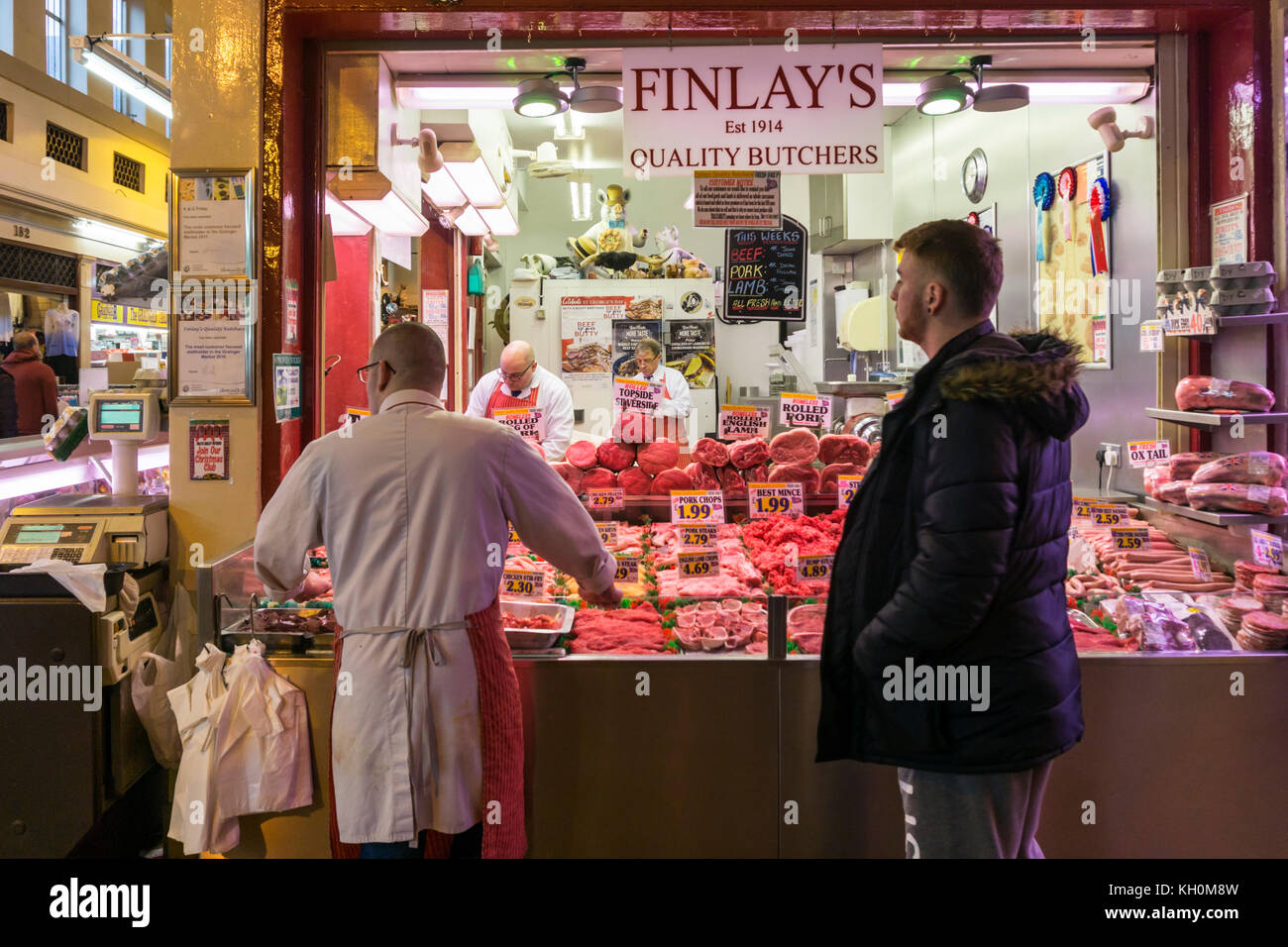 A butcher's stall in Grainger Market, Newcastle upon Tyne Stock Photo