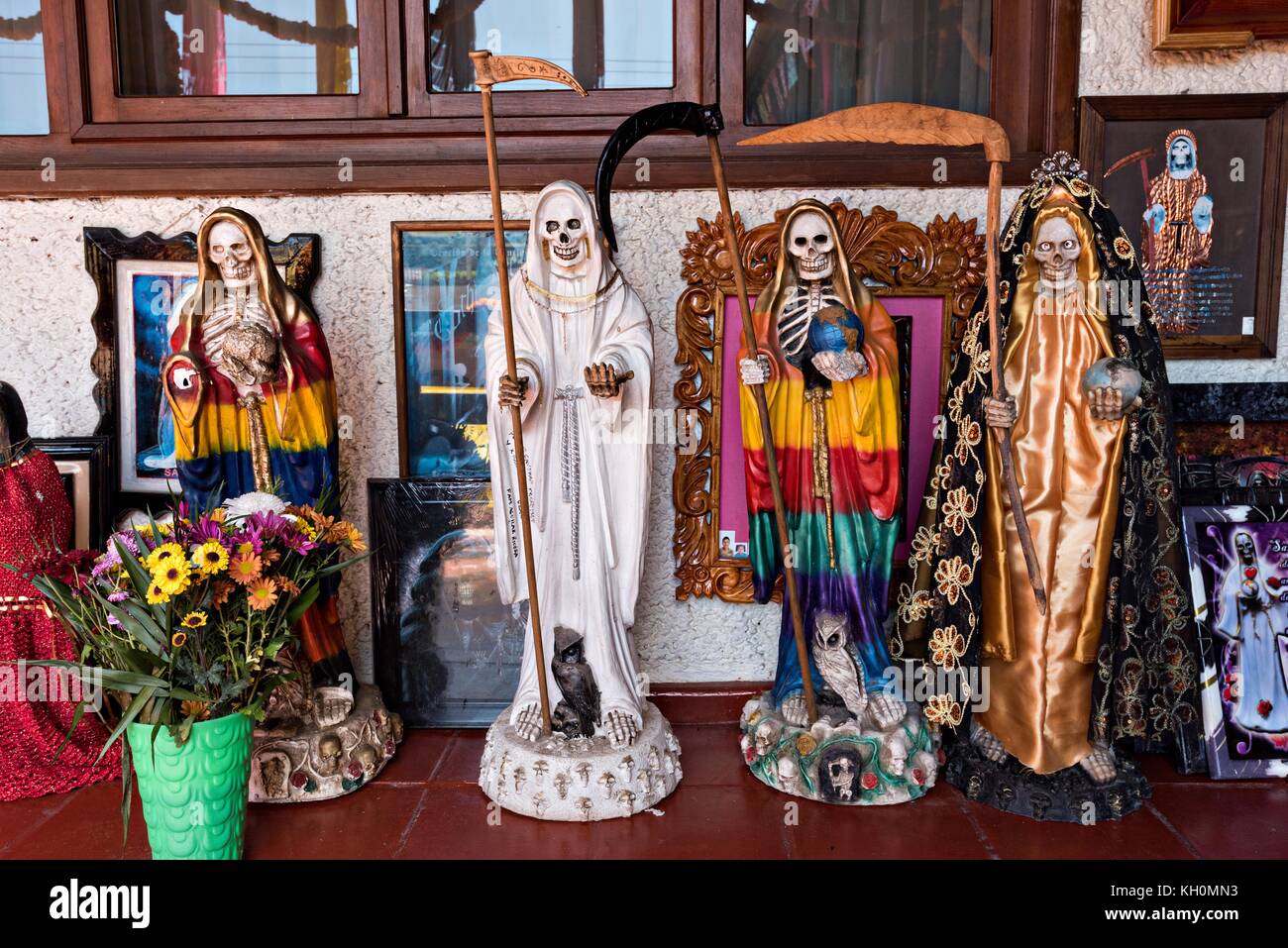 A shrine and offerings inside the La Casa De La Santa Muerte or House of the Saint of the Dead November 1, 2017 in Santa Ana Chapitiro, Michoacan, Mexico. Stock Photo