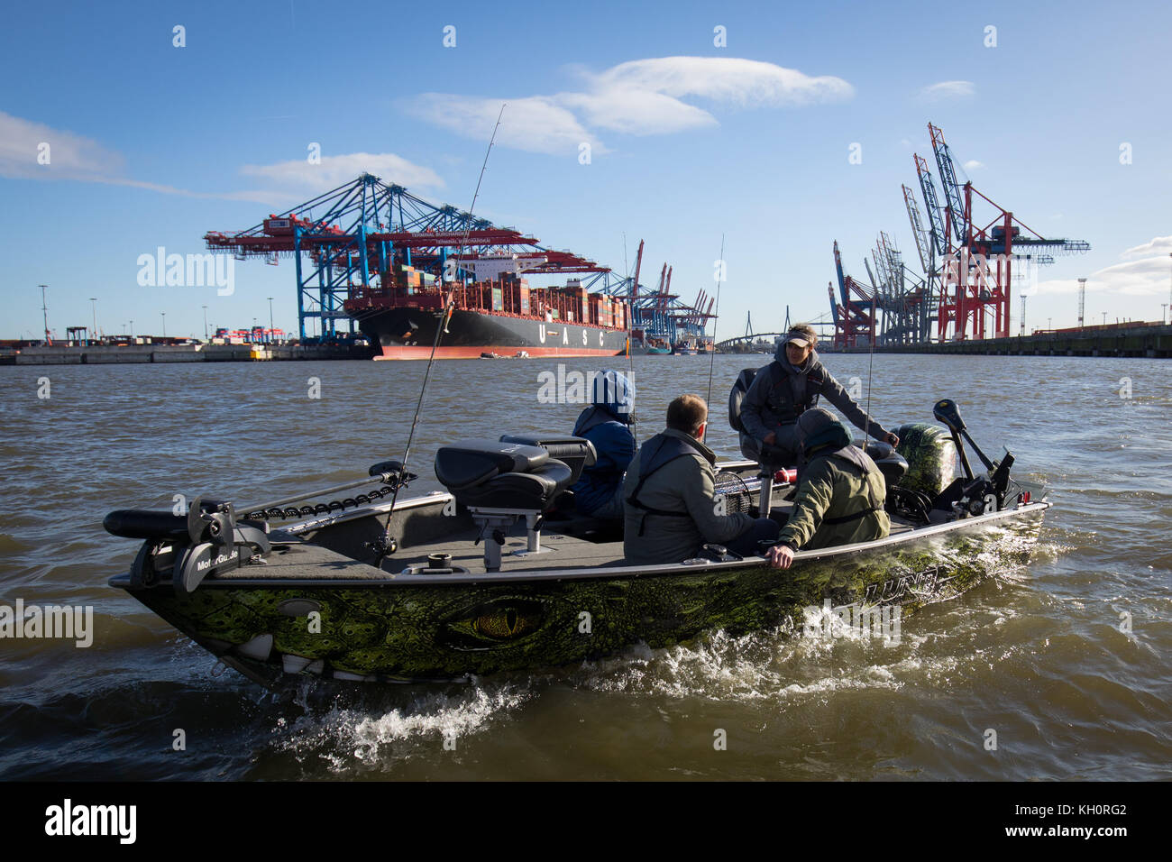 Fishing tour organiser Najwa 'Natsch' Hussein (R) and her guests sit in