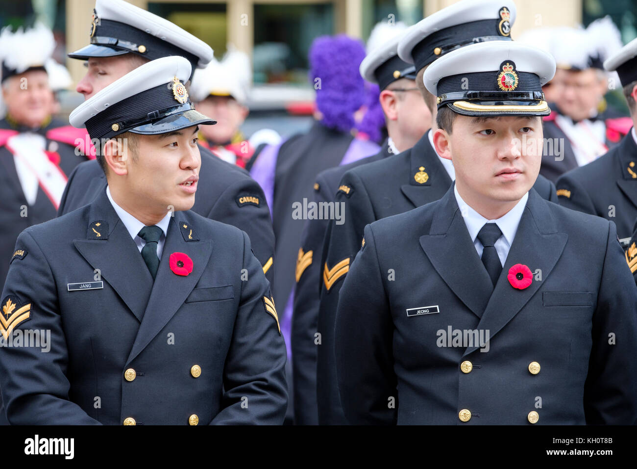 Two Asian servicemen at the Remembrance Day parade held in London, Ontario, Canada. Stock Photo