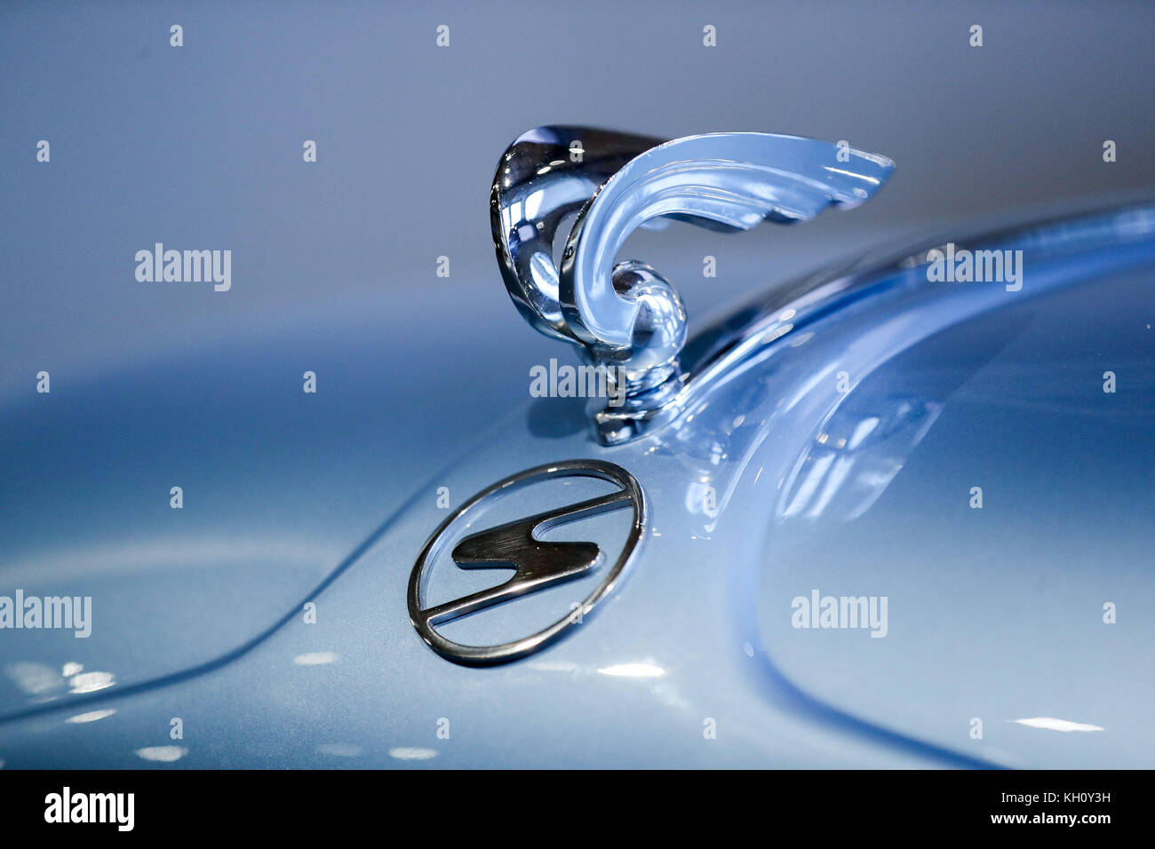 the old hood ornament of car manufacturer horch top and the new stock photo alamy