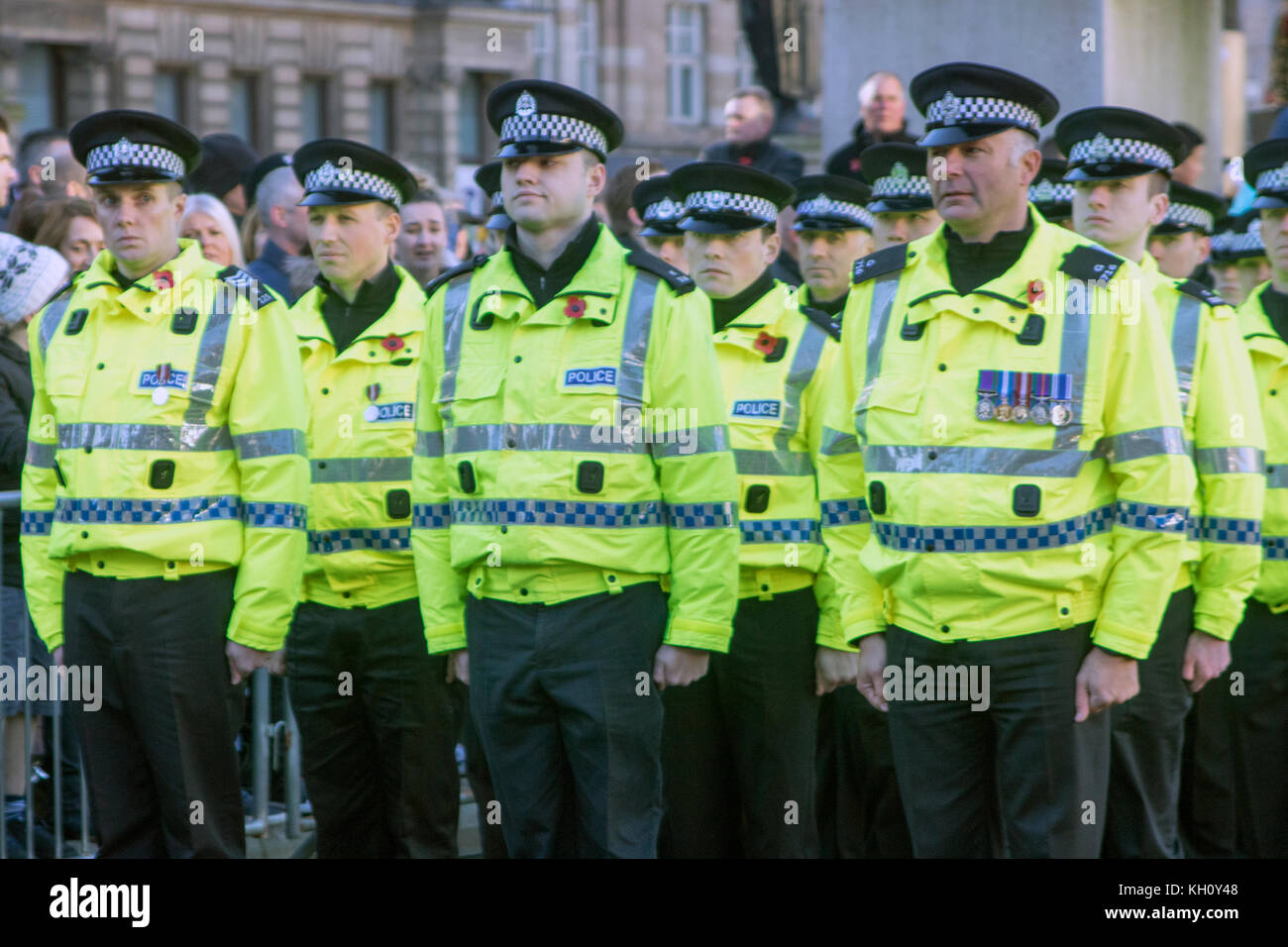 Glasgow, Scotland, UK. 12th November, 2017. A two-minute silence to mark Remembrance Sunday has been observed at 11:00 at the Cenotaph in George Square, Glasgow. In her role as Lord Lieutenant, Lord Provost Eva Bolander led the ceremony, with the Moderator of the Church of Scotland Glasgow Presbytery, Rev. Ian Galloway, leading prayers. Also in attendance amongst serving military, veterans, and the public, was Deputy First Minister John Swinney, representatives of the British Armed Forces, and of Police Scotland and the Scottish Fire and Rescue Service. Iain McGuinness / Alamy Live News Stock Photo