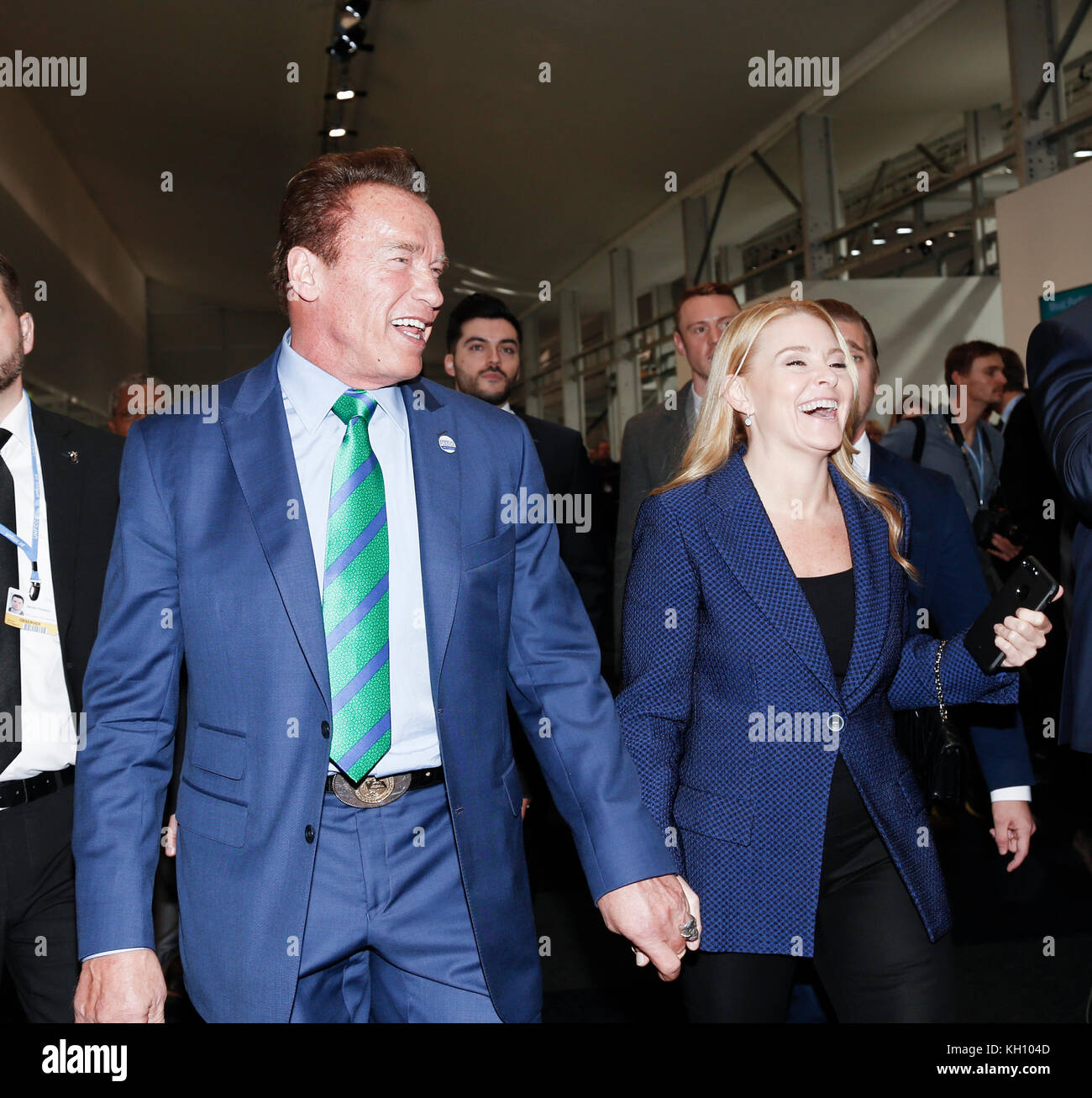 Bonn, Germany. 12th Nov, 2017. Arnold Schwarzenegger, R20 Founding Chair and Governor of California with his girlfriend Heather Milligan at the COP23 Fiji conference in Bonn, Germany on the 12th of November 2017. COP23 if organized by UN Framework Convention for Climate Change. Fiji holds presidency over this meeting in Bonn. Credit: Dominika Zarzycka/Alamy Live News Stock Photo