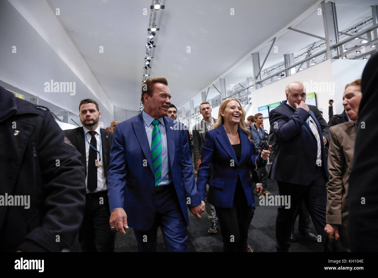 Bonn, Germany. 12th Nov, 2017. Arnold Schwarzenegger, R20 Founding Chair and Governor of California with his girlfriend Heather Milligan at the COP23 Fiji conference in Bonn, Germany on the 12th of November 2017. COP23 if organized by UN Framework Convention for Climate Change. Fiji holds presidency over this meeting in Bonn. Credit: Dominika Zarzycka/Alamy Live News Stock Photo