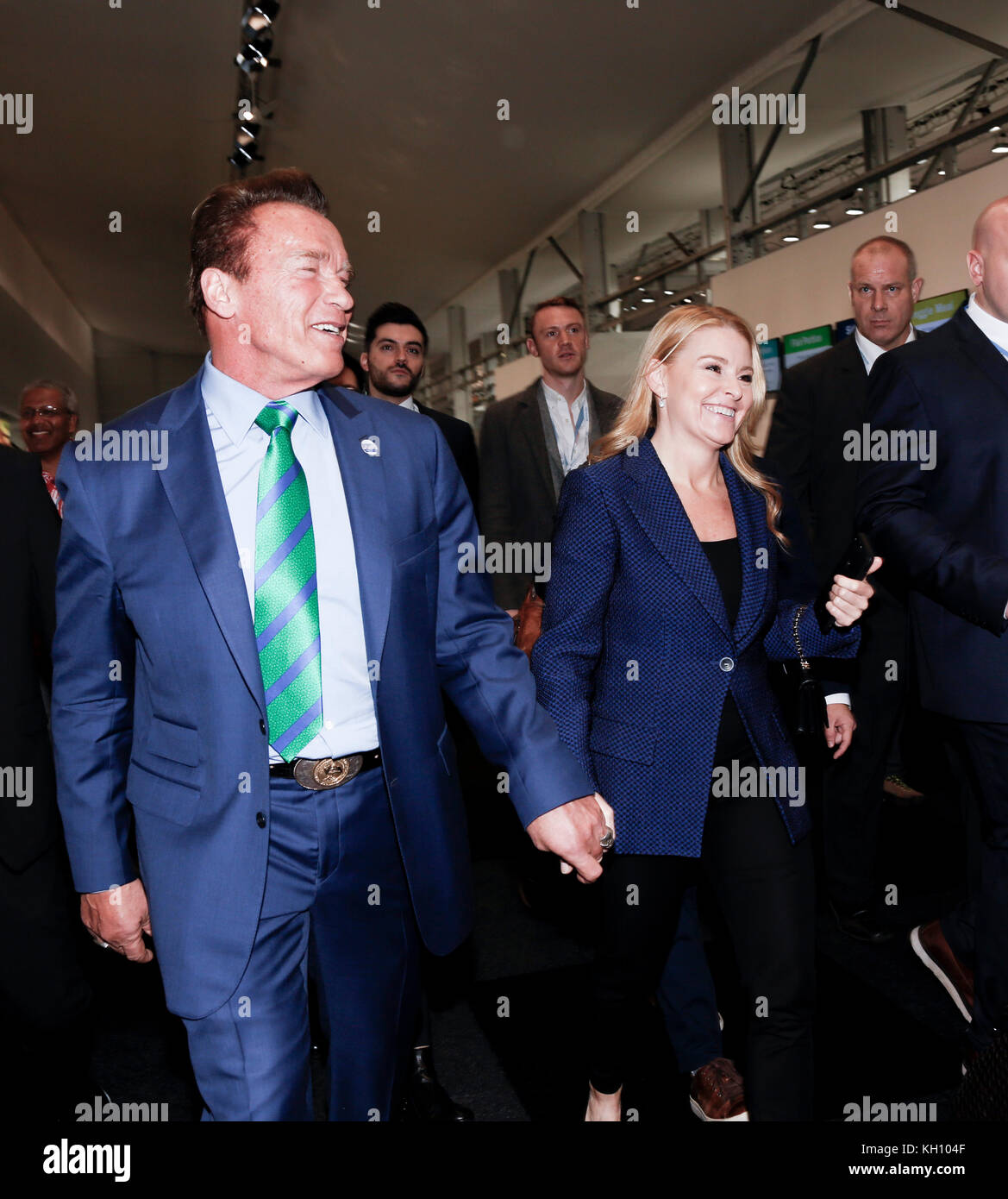 Bonn, Germany. 12th Nov, 2017. Arnold Schwarzenegger, R20 Founding Chair and Governor of California with his girlfriend Heather Milligan at the COP23 Fiji conference in Bonn, Germany on the 12th of November 2017. COP23 if organized by UN Framework Convention for Climate Change. Fiji holds presidency over this meeting in Bonn. Credit: Dominika Zarzycka/Alamy Live News Stock Photo