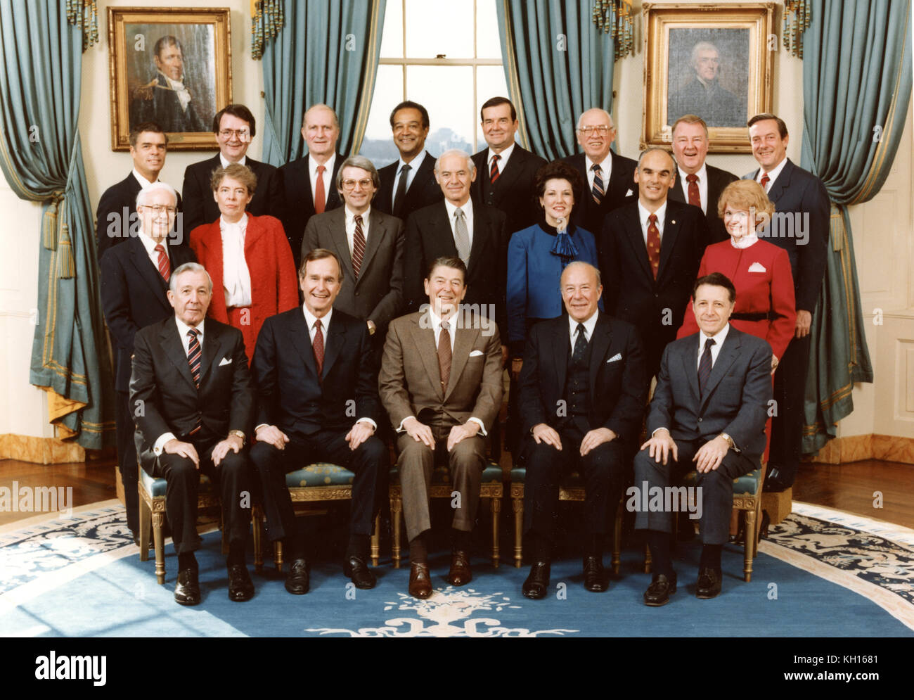 President Ronald Reagan poses on the third anniversary of his inauguration with members of his cabinet and aides at the White House. First row: Donald Regan, George Bush, Mr. Reagan, George Schultz, Casper Weinberger. Second row: Terrell Bell, Jeane Kirkpatrick, David Stockman, William French Smith, Elizabeth Dole, Donald Hodel, Margaret Heckler. Third row: John Block, Raymond Donovan, Malcolm Baldridge, Samuel Pierce, William Clark, William Casey, Edwin Meese and William Brock. Washington, DC, 1/20/1984. Photo by Michael Evans. Stock Photo