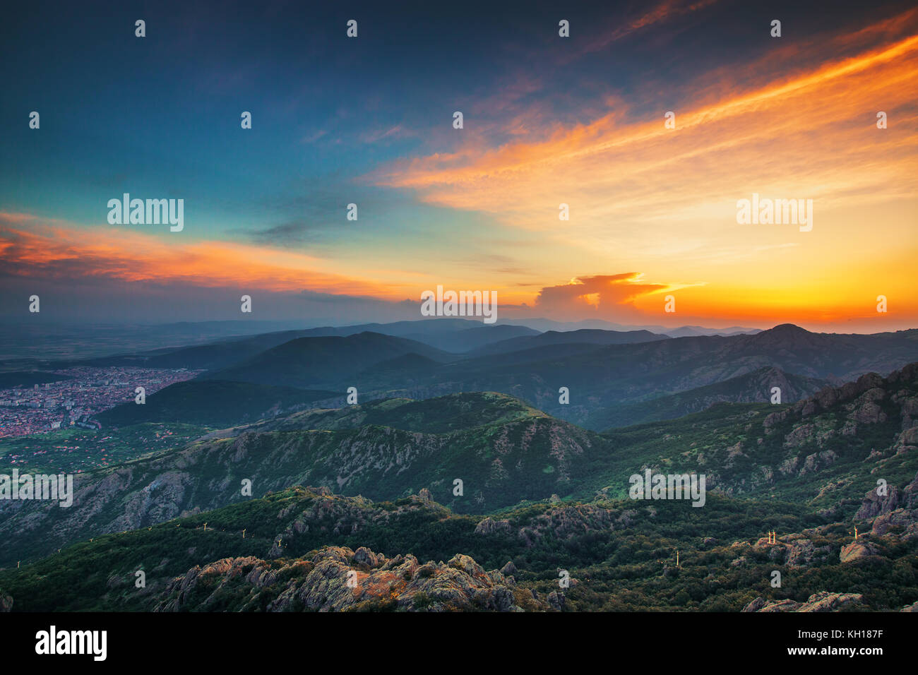 Beautiful sunset over the mountain Stock Photo - Alamy