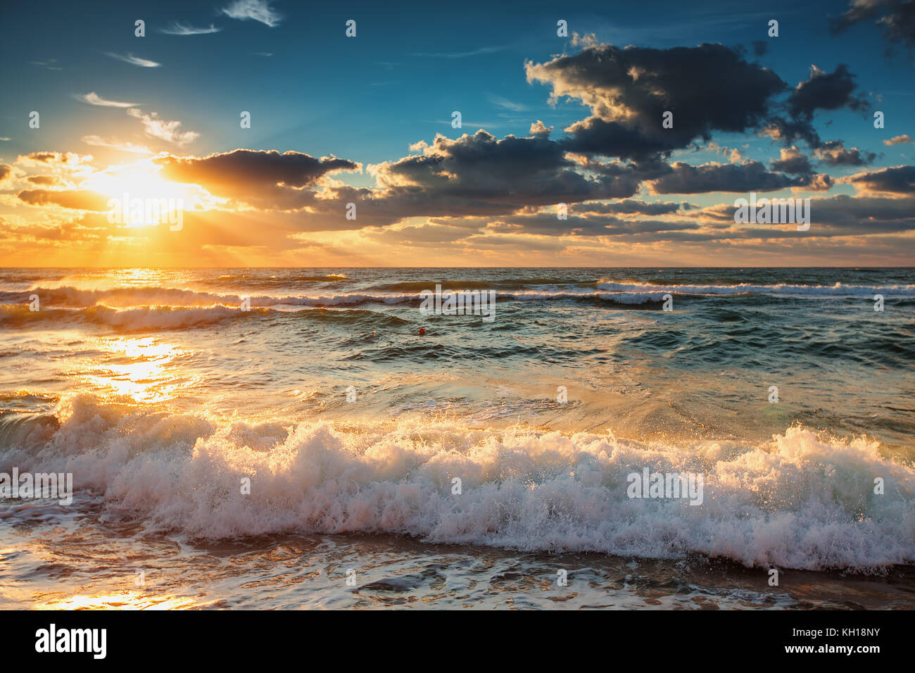Beautiful cloudscape over the sea, sunrise shot Stock Photo - Alamy