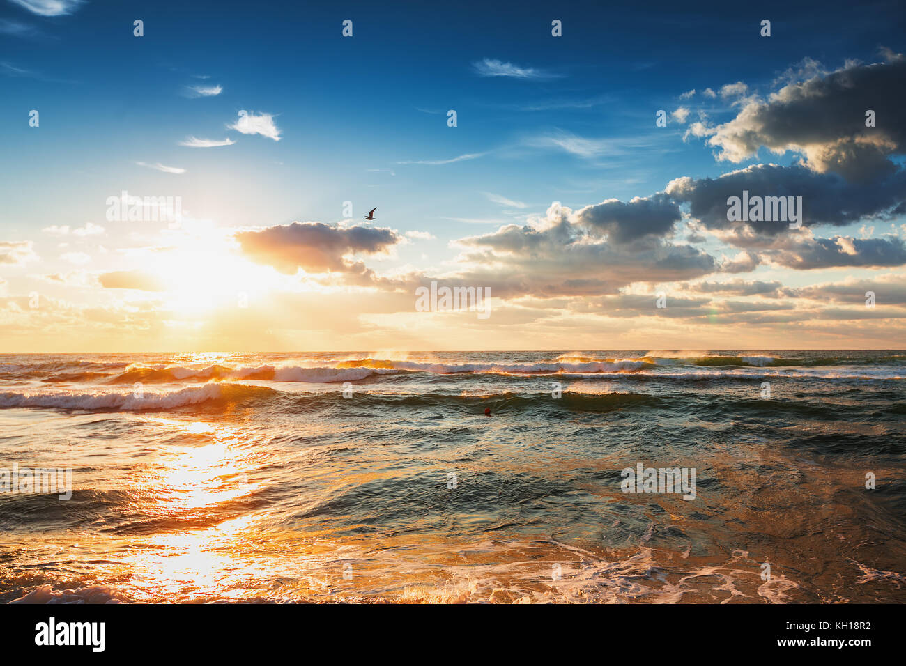 Beautiful cloudscape over the sea, sunrise shot Stock Photo - Alamy