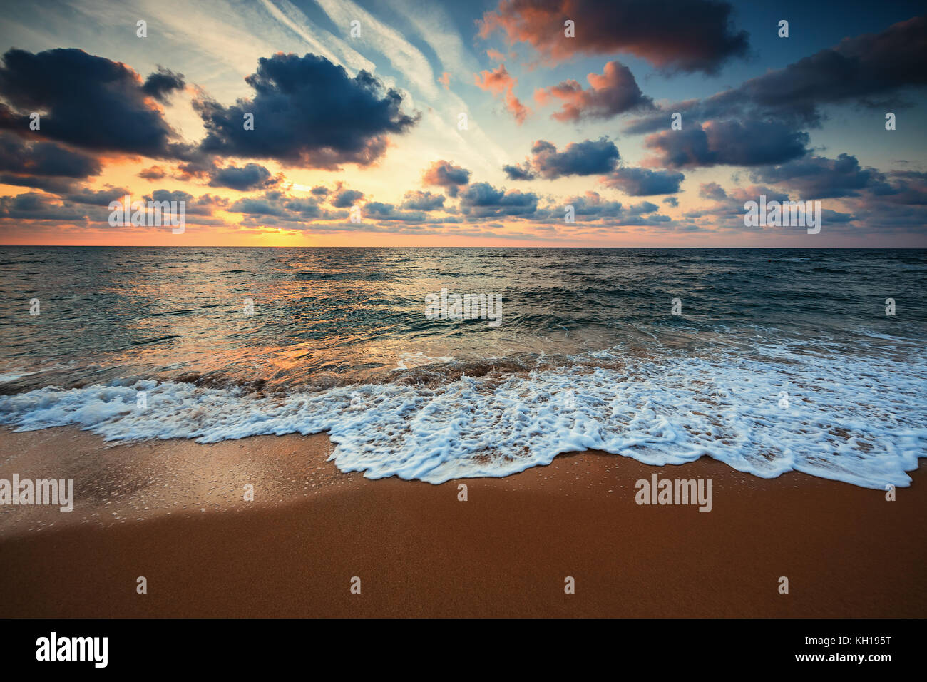 Beautiful cloudscape over the sea, sunrise shot Stock Photo - Alamy
