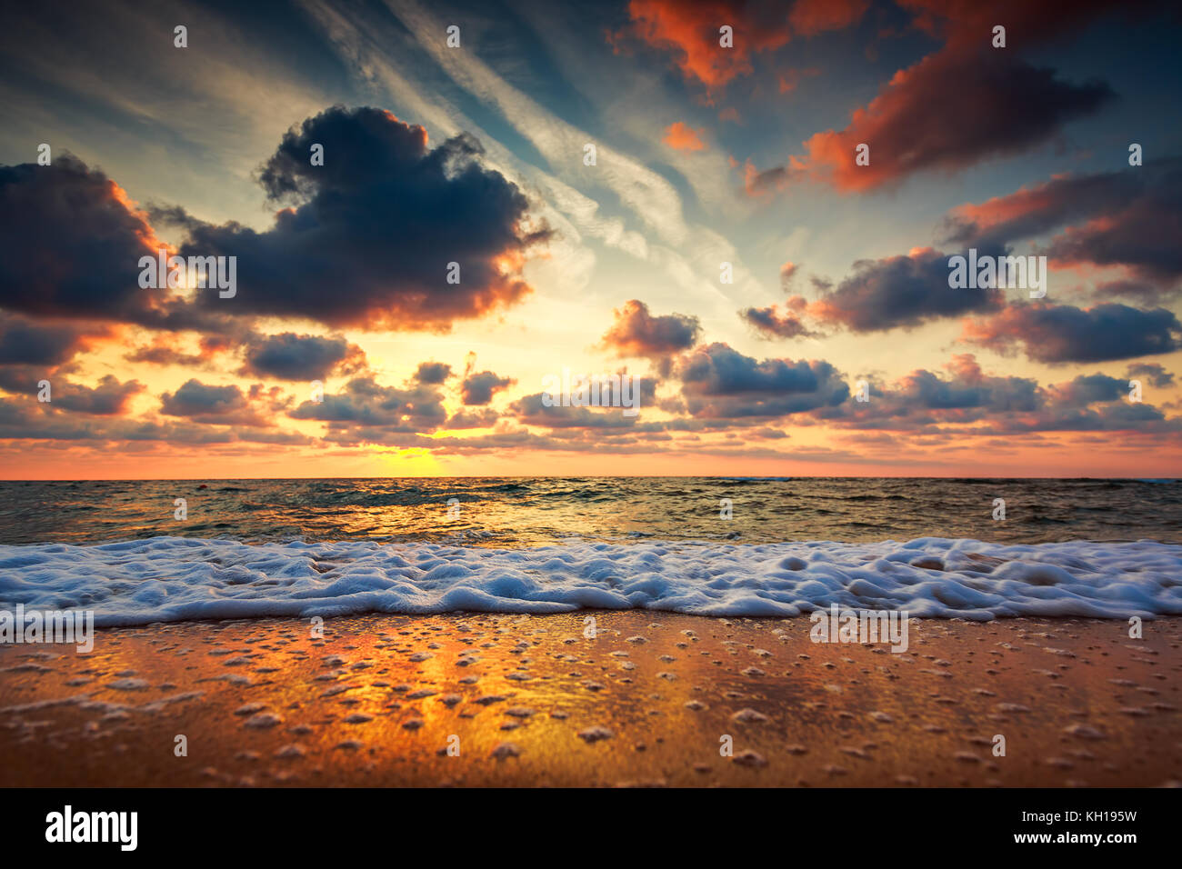 Beautiful cloudscape over the sea, sunrise shot Stock Photo - Alamy