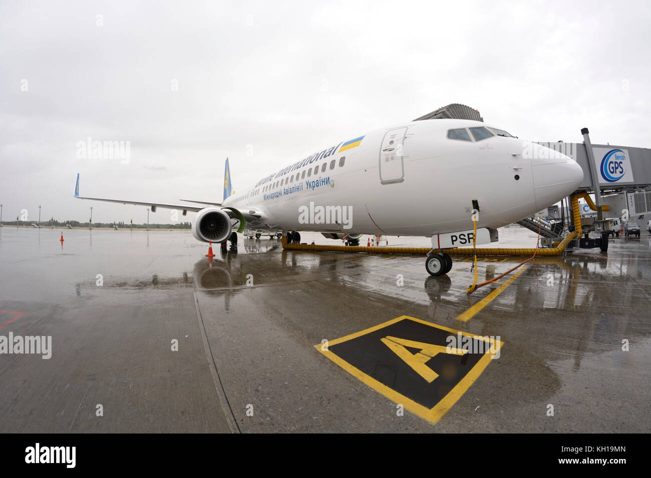 Aircraft Boeing 737-400 standing on aircraft parking space, ready for technical inspection. Stock Photo