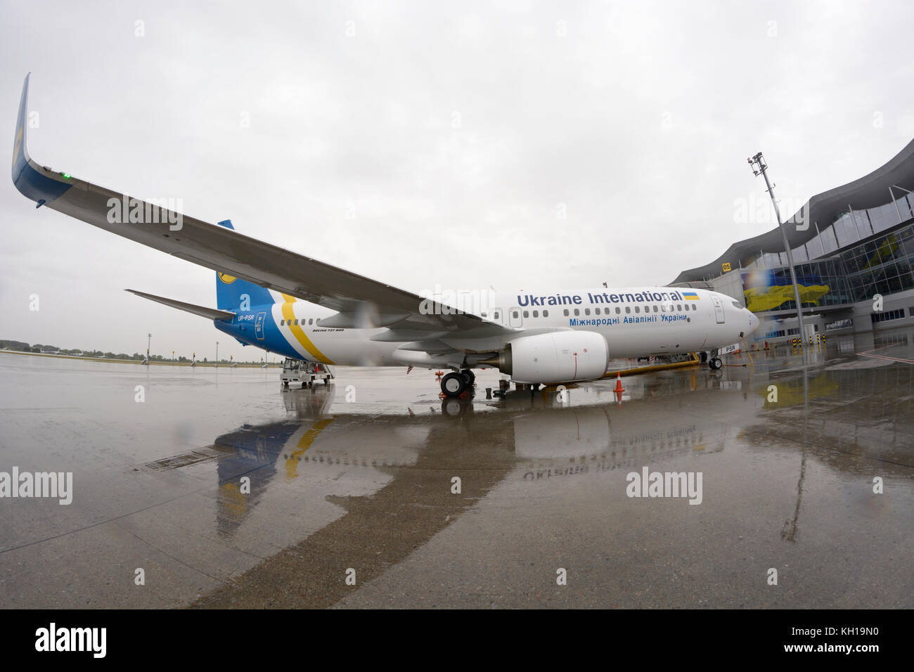 Aircraft Boeing 737-400 standing on aircraft parking space, ready for technical inspection. Stock Photo