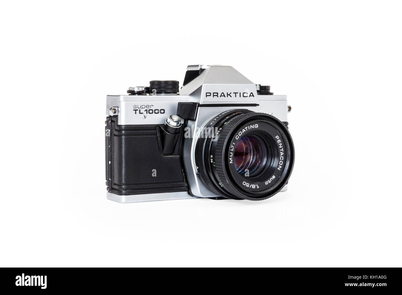 Praktica Super TL1000 35mm roll film SLR camera with 50mm Pentacon lens, 1980s, isolated against a white background Stock Photo