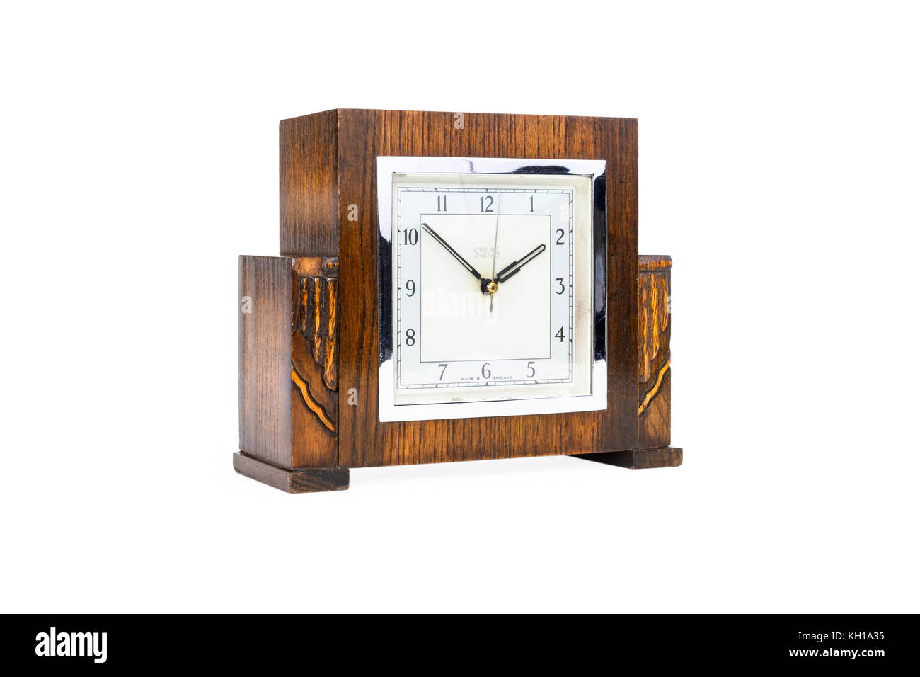 A vintage square-faced Sterling synchronous electric clock in polished wooden case, c1937 Stock Photo
