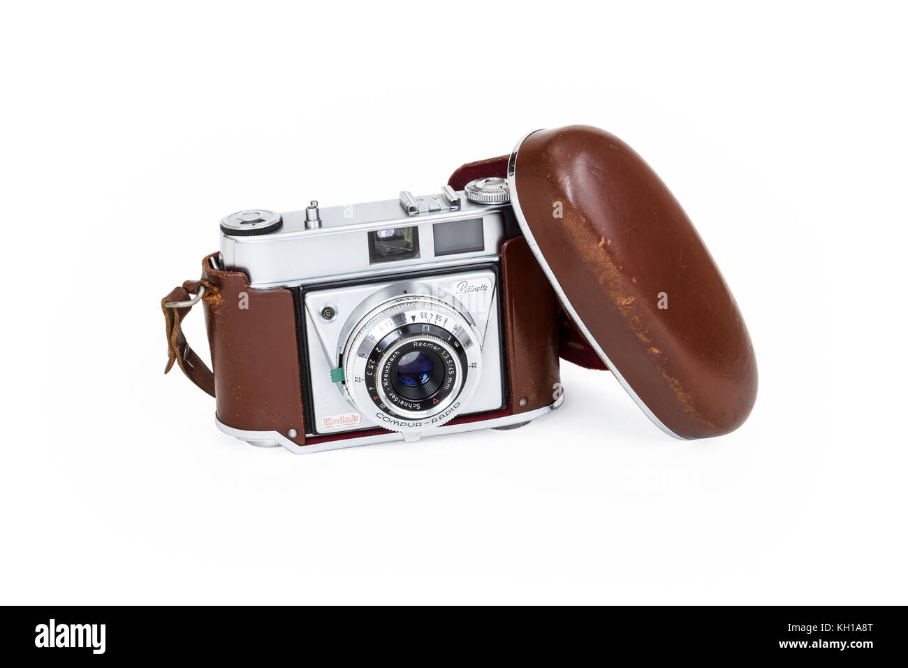 1950s Kodak Retinette 35mm roll film camera with Schneider-Kreuznach Reomar 45mm lens, in original leather case, isolated against a white background Stock Photo