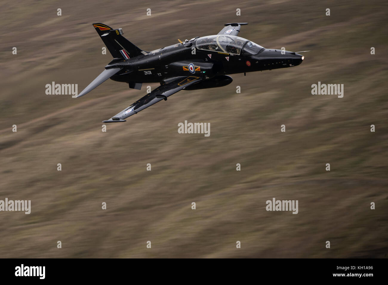 Royal Air Force Hawk T2 aircraft conducting low flying training through Snowdonia National Park in Wales. Stock Photo