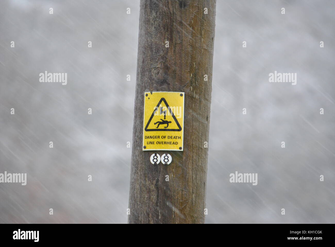 Danger of Death Warning Sign, taken during a blizzard. Scotland. Stock Photo