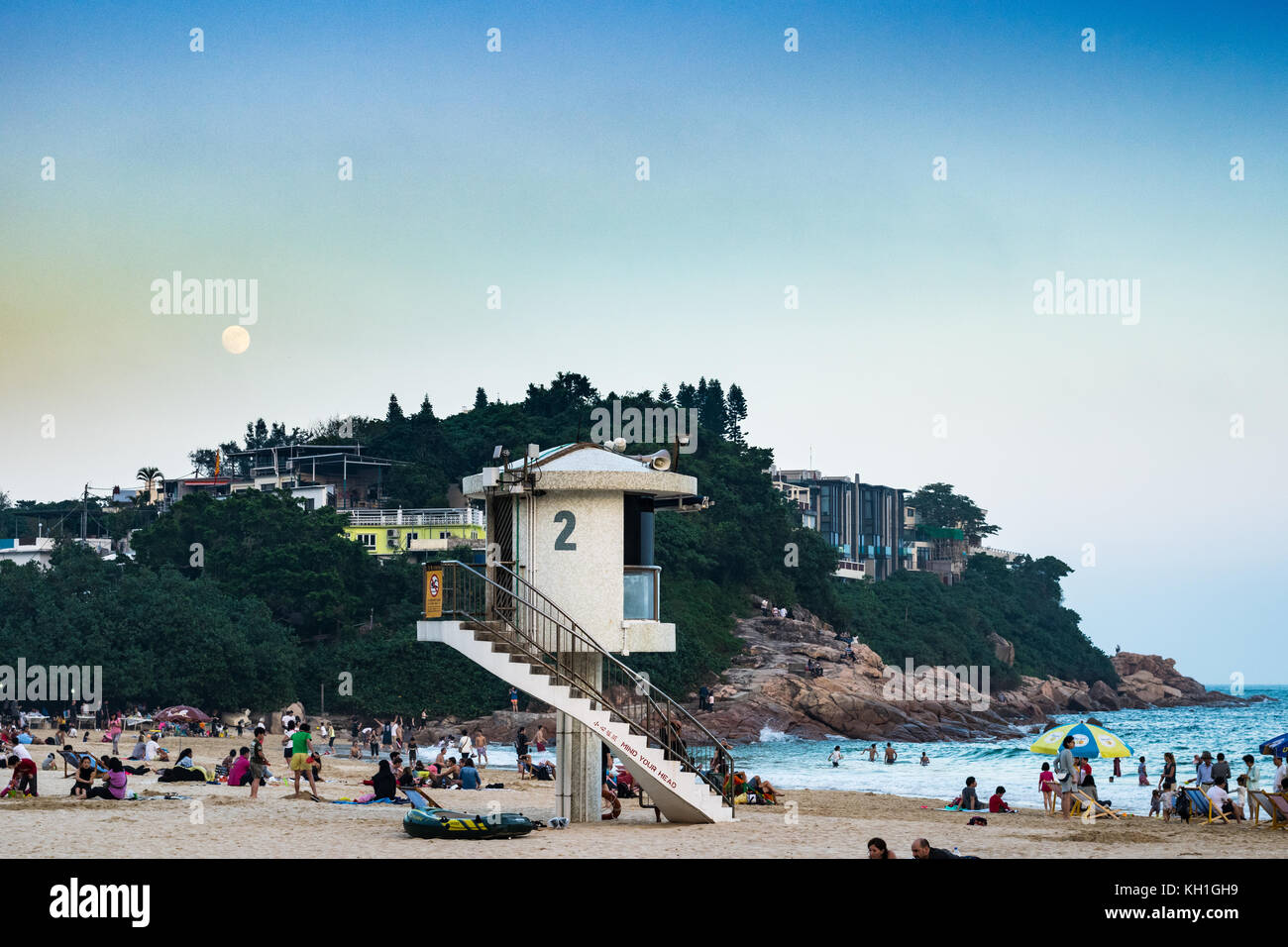 Lifeguard tower station at Shek O Beach and beachgoers in Hong Kong SAR Stock Photo
