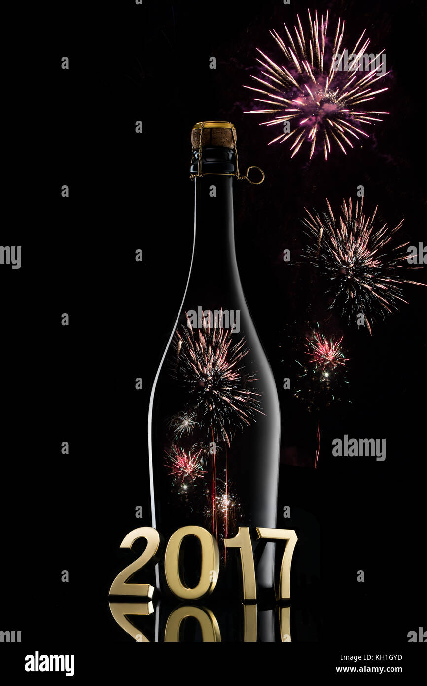 Champagne wine bottle on black with 2017 concept Stock Photo