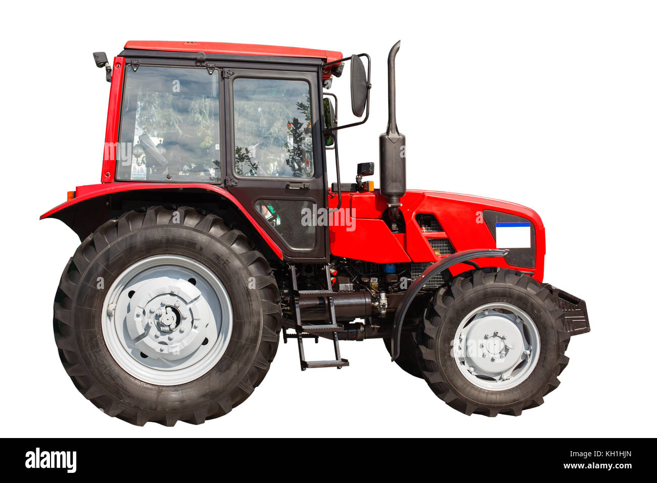 New red agricultural tractor isolated on white background with clipping ...