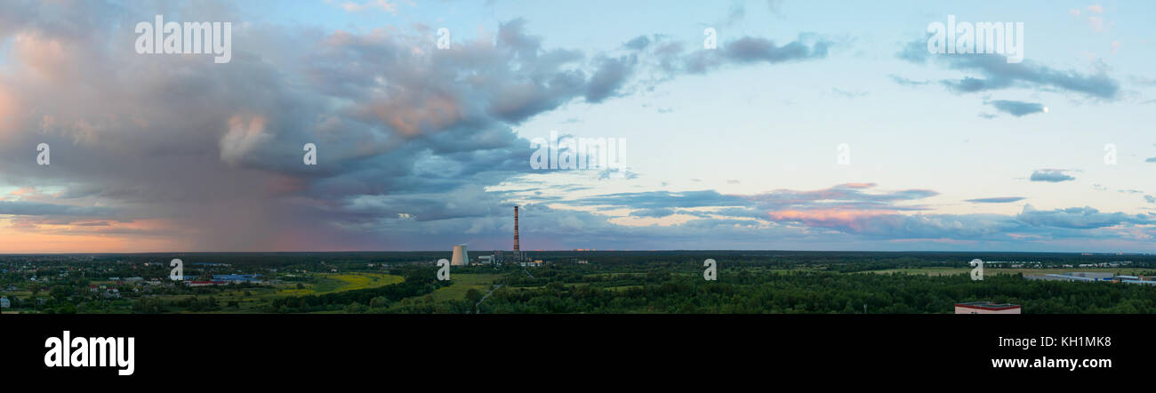 Storm head rising over the horizon on summer sunset Stock Photo - Alamy