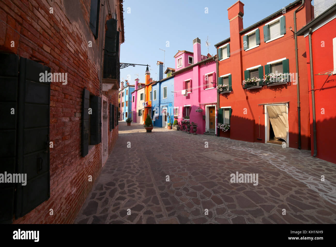 exterior of the colorful houses of the island of Burano near VENICE in Italy Stock Photo