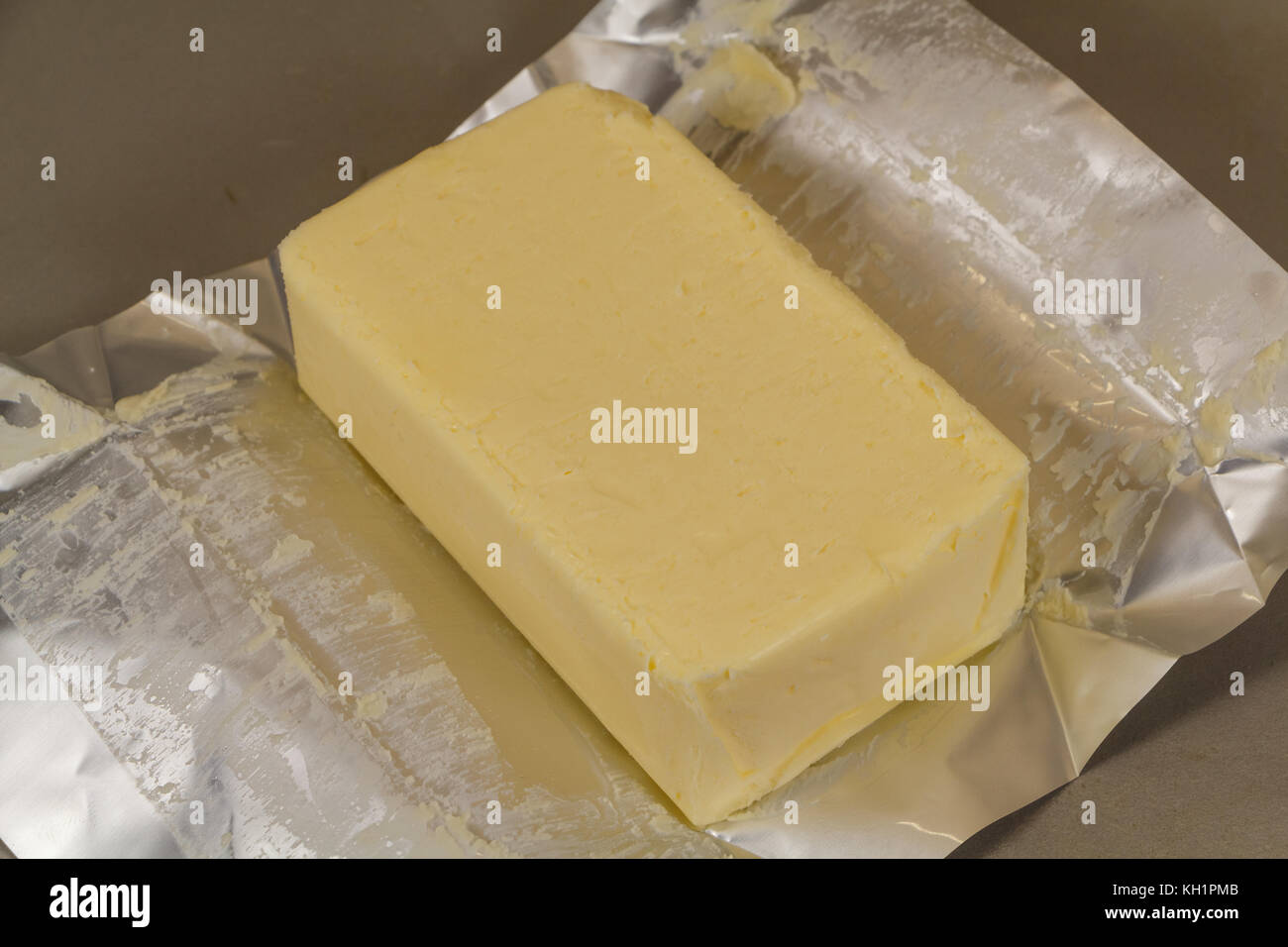 Pack of salted butter unwrapped Stock Photo