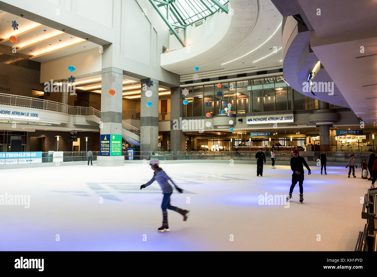 public skating in the underground ice rink at Atrium 1000, Montreal, QC, Canada Stock Photo Alamy