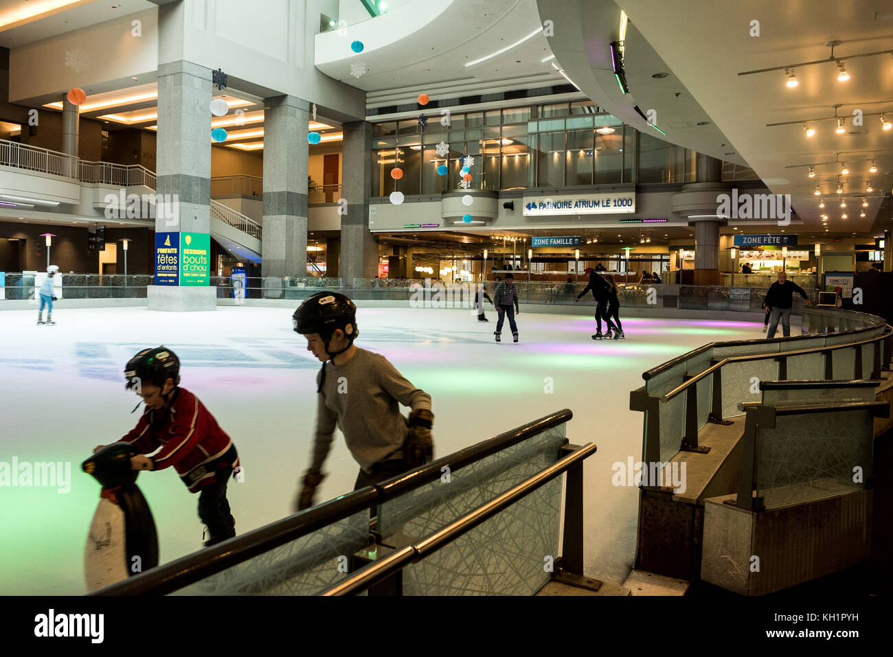 public skating in the underground ice rink at Atrium 1000, Montreal, QC, Canada Stock Photo Alamy