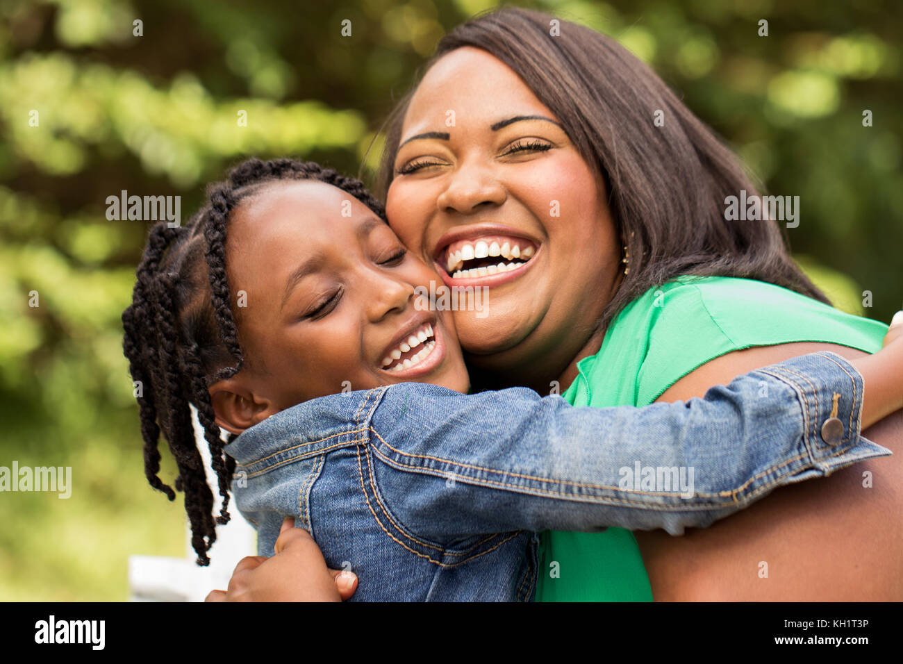 Portrait of a happy African American family Stock Photo - Alamy