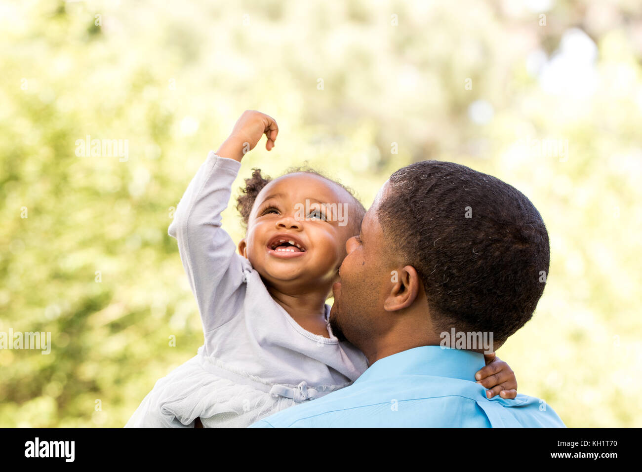 Portrait of a happy African American family Stock Photo - Alamy