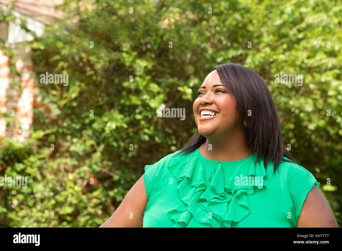 Portrait of a happy African American woman Stock Photo - Alamy