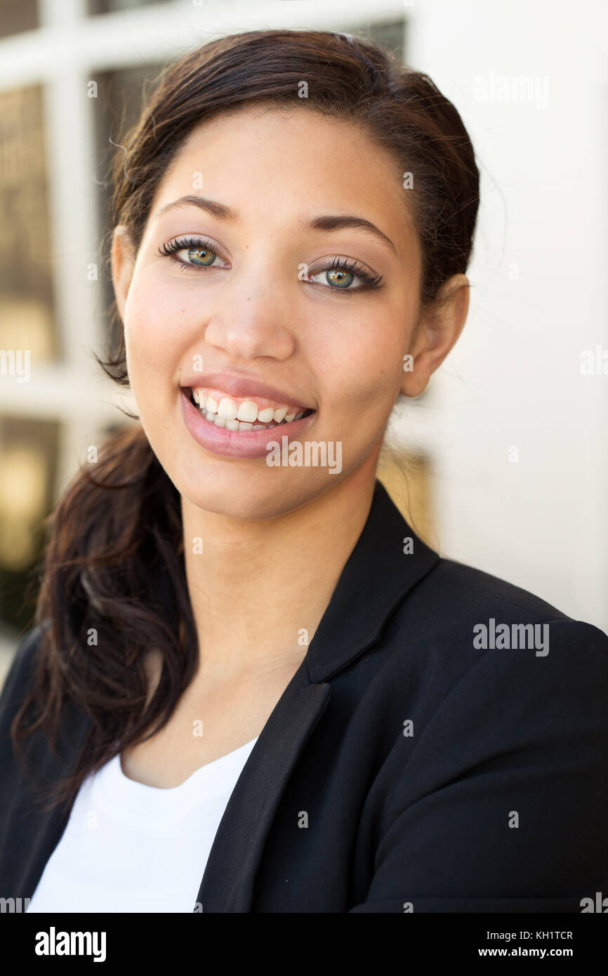 Young Business Woman Standing Outside An Office Building Stock Photo