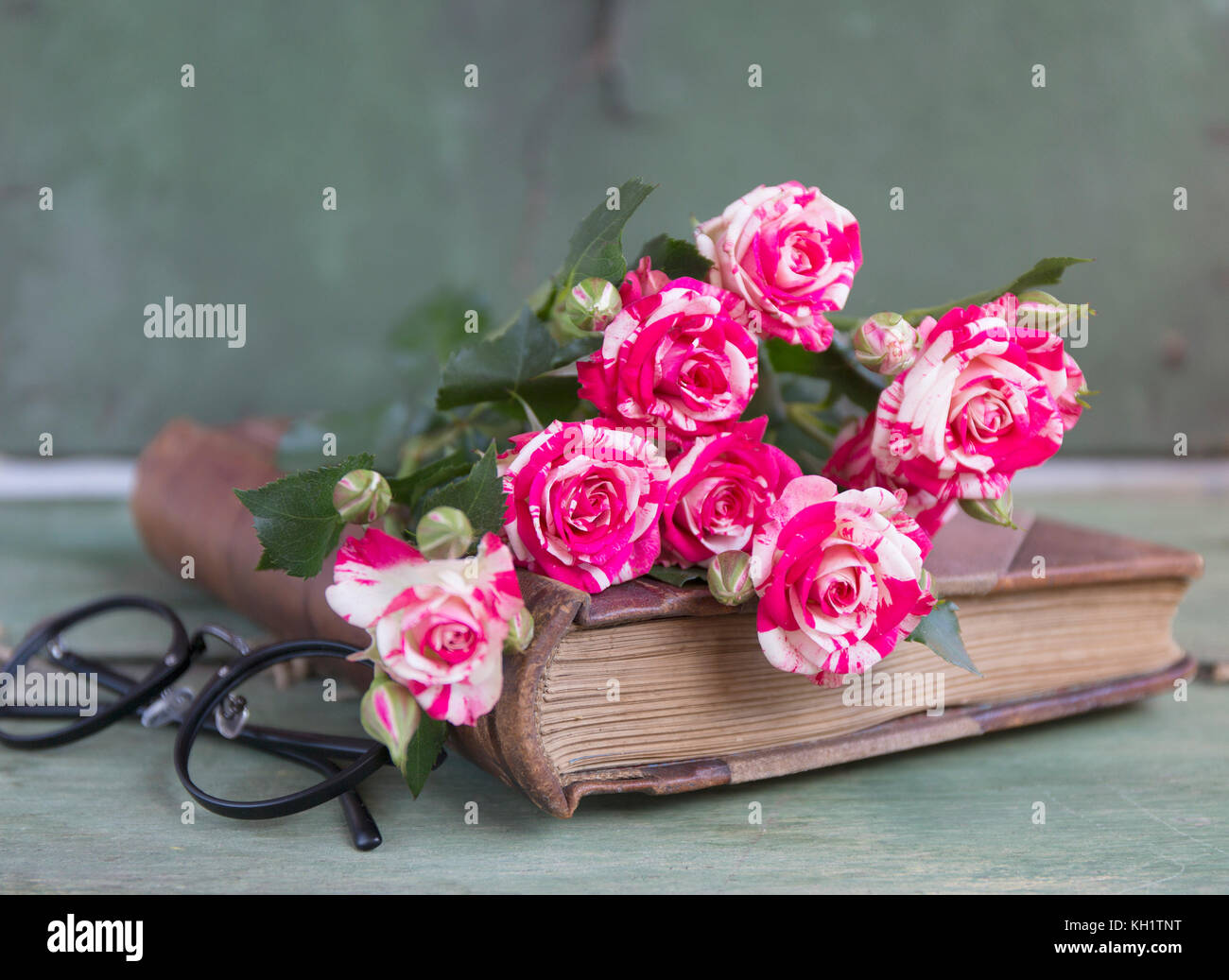 Notebook Pink Roses Vintage notebook mock up for artwork with pink roses. Place for text ...