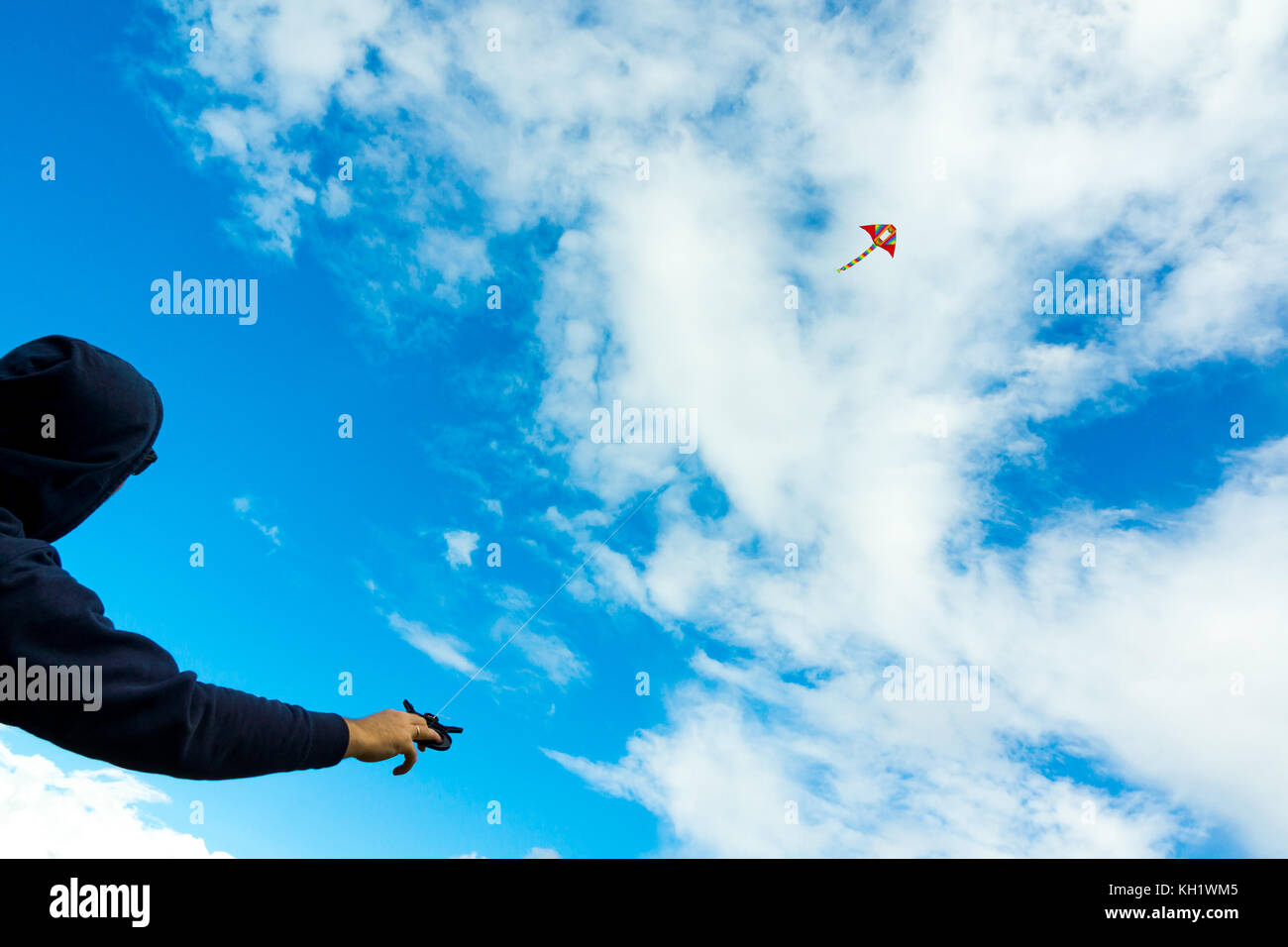 Hands holding kite Stock Photo - Alamy