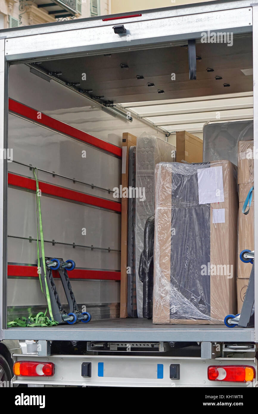 Packed furniture shipment in delivery truck Stock Photo Alamy