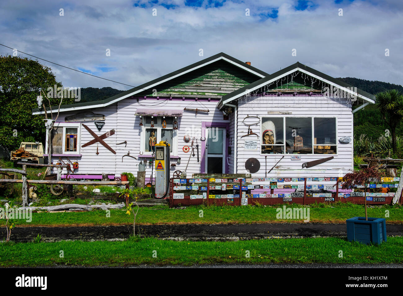 Colourful deccorated house  on  the road between Fox Glacier and Greymouth, South Island, New Zealand Stock Photo