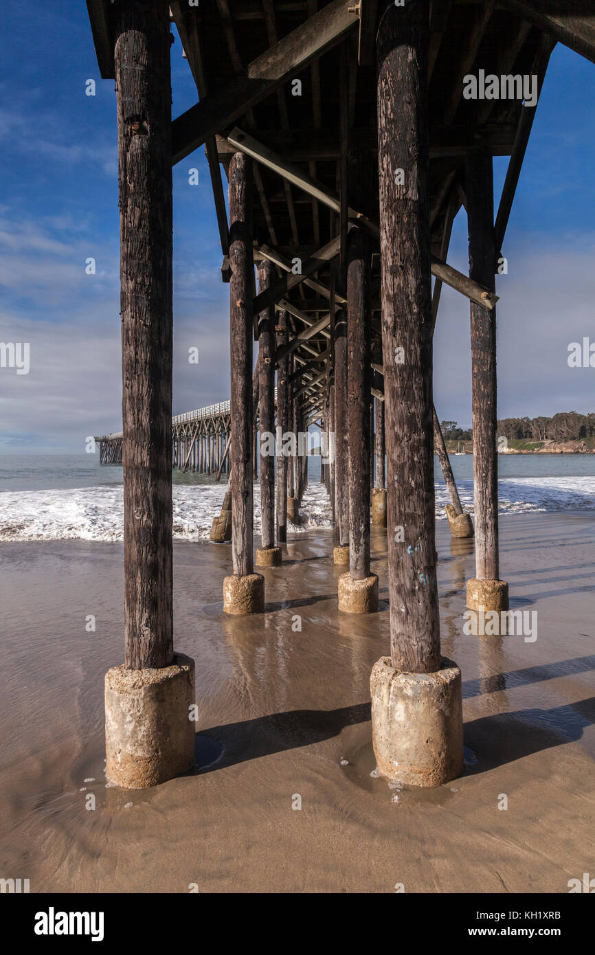 Under the pier or jetty at Randolph Hearst Memorial State Beach, near the historic town of San Simeon, California. Stock Photo
